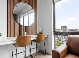 Luxury Downtown High-Rise Condo with Pool, Gym, Parking