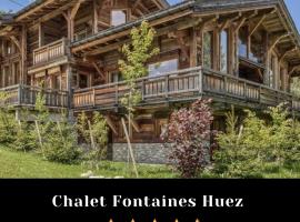 Chalet Fontaines Huez, hôtel à Huez