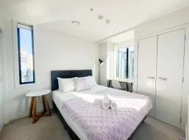 Sky Tower Views 2BR Retreat Wit h FREE Pool Gym