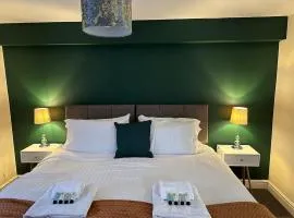 Orange Lilly in Stroud with Free Parking