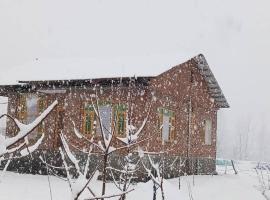 Sofi Gulmarg Guest House, hotel a Tangmarg