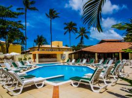 Happy Hotel Girassol, hotel en Praia de Taperapuã, Porto Seguro