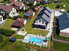 Apartmánové domy s bazénem Lipno 1, hotel a Frymburk