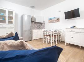 Grazioso bilocale a Santa Teresa di Gallura, отель в Санта-Тереза​-Галлура