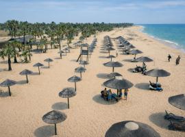 Netu's Village Resort โรงแรมในBelas