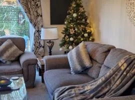 Stunning Fir Trees Corner 3 bedroom detached Executive house with free drive way parking for 2 vehicles 1 mile from M5 dogs welcome
