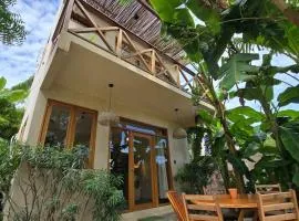 Casa Plátano Villa and palapa with garden steps from lagoon