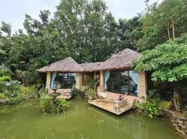 เคียงมูล ริเวอร์ไซด์ วิลล่า Kiang Mun Riverside Villa & Cafe