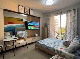 Cozy Condo at Lapu Lapu Near Beaches, hotel em Suba