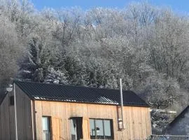 Ferienhaus Eifel-Vulkaneifel eifelhausaufzeit Sauna Yoga-Raum Kaminofen Vulkan-Blick