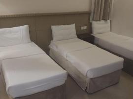 فندق الرسالةالذهبي شارع ام القري, hôtel à Aş Şafā