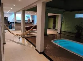 Casa Espaçosa com Piscina e Área Gourmet para Temporada