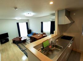 海に近い田舎にある新築家の丹霞阁, cabin in Itoman