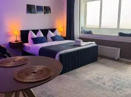 CuxHeaven - modernes Studio-Apartment direkt am Meer mit Pool, Sauna und Massage