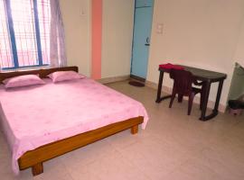 Budget Friendly Rooms at Taj Residency Holiday Homestay, Hotel in Jorhat