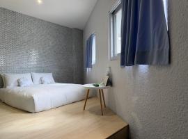 King Wow Inn, hoster&iacute;a en Tainan