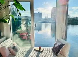 Central and luxurious floating home with garden