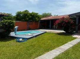 Recanto Familiar - Casa com Piscina até 9 pessoas em Imbé