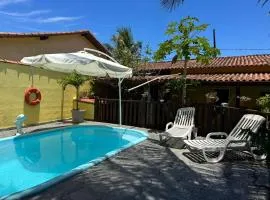 Casa com piscina e churrasqueira para familia