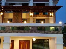 Woon homestay 2, hotel en Balik Pulau
