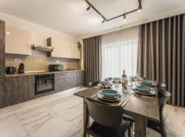 NEW - Only Suites Unit 5 Modern 2-Bedroom apartment with common heated Jacuzzi by SF Homes