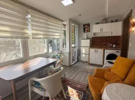 Renovated 2BR Garden Flat 300 m to Sarımsaklı Beach