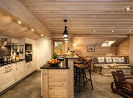 Chalet moderne 5* à Courchevel La Tania - 12 pers, jacuzzi, sauna, skis aux pieds, cheminée, cinéma - FR-1-575-154