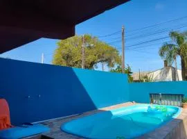 Casa com piscina próxima ao centro de eventos Marisol