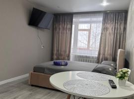 Новая уютная квартира, Hotel in Rudny