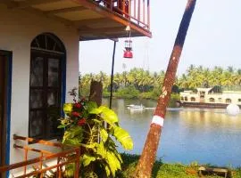 RivoGoa Homestay - riverside cottage near mopa airport