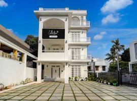 Collection O Kulathoor TechnoparkFormerly United Mansions，位于Poojapura的酒店
