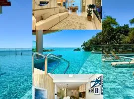 Apartamento em Condomínio Frente-Mar com Piscinas, Jacuzzi Aquecida, Sauna, Academia, Brinquedoteca, Churrasqueira na Sacada, Cozinha Completa e Lazer de Home Club