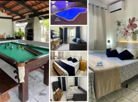 Casa com PISCINA - 02 Quartos à 900m PRAIA e 3km do Beto Carrero - Estacionamento - Area de LAZER com Churrasqueira e SINUCA - Wi-Fi e Cozinha Completa