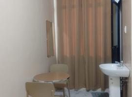 Rey's Pension House - Double Deluxe 1, hotel sa Puluan