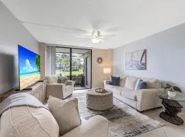 Walkout condo with beach access, pool and pickleball