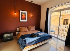 Sliema Central with Balcony Airconditioned and Comfortable Self Check IN, hotel i Il-Gżira