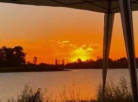 Eco house in a gated neighborhood with a lagoon and dock