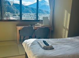ホテル富士山水館富士山一望河口湖車で3分HotelFujisanSuikanMtFujiView3 MinutesbyCartoLakeKawaguchi, hotel i Fujikawaguchiko