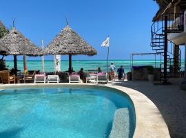 Blue Reef Sport & Fishing Lodge and Bungalows, chal&eacute; alpino em Jambiani