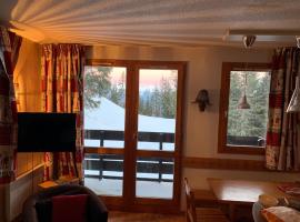 P2-3 esprit chalet sur les pistes de Courchevel, hotel in Courchevel