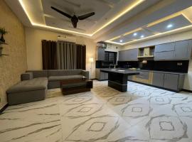 ASNB Residences 2BHK -F4, hotel in Multan