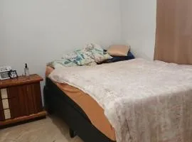 Quarto para casal Ar condicionado Tv