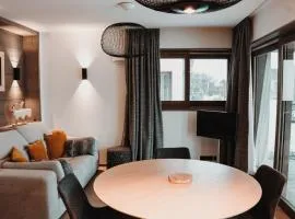 Appartement moderne, proche des pistes avec 2 chambres, Wi-Fi et parking à Courchevel Le Praz - FR-1-568-50