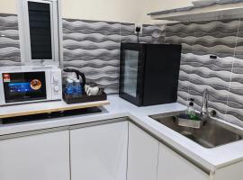 Qalsharyna Chalet inn, hotell i Simpang
