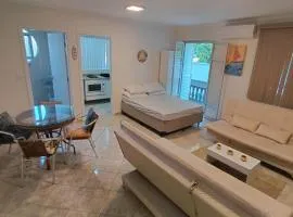 Studio pé na areia Pereque - Açu