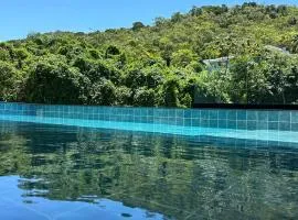 Flat Novo a 200 m da praia de Bombas - piscina, academia e jacuzzi