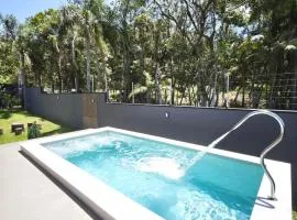 Casa Woods seu Refúgio na Praia do Estaleiro