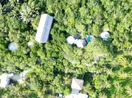 New Ruins Off-The-Grid SuperAdobe Domes with Pool