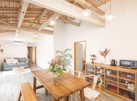 Lucia Seaside Villa Amami: Amami şehrinde bir otel