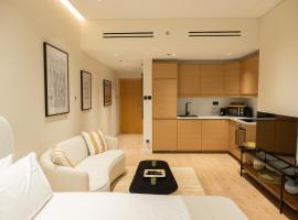 Stylish cozy studio in the heart of Business Bay, hôtel à Sabkhah